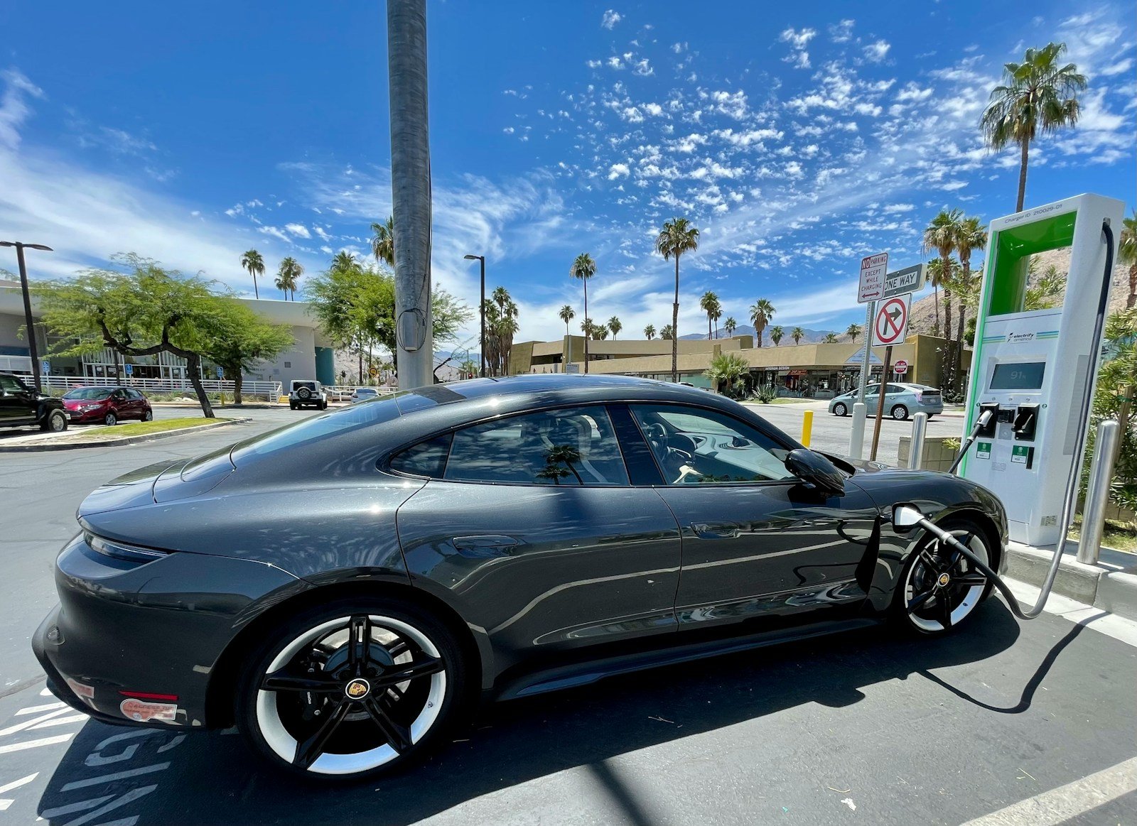 black sedan on road during daytime